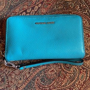 Beautiful Teal Michael Kors Tech Wristlet.